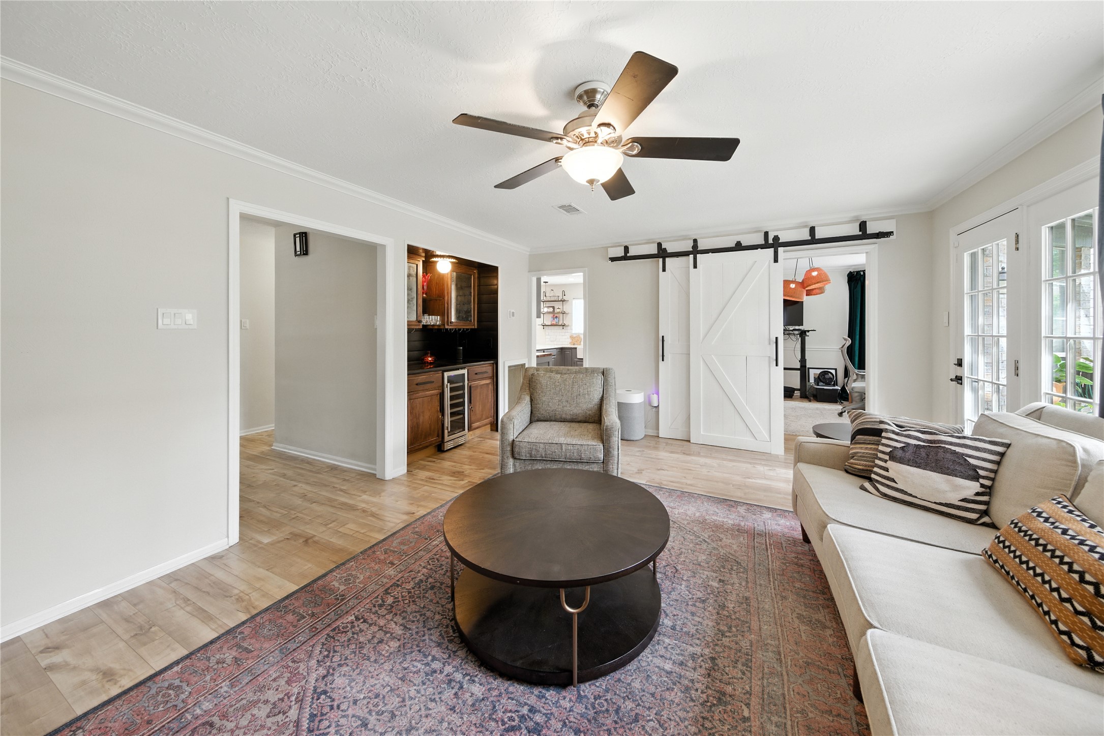 115 Regency Way Conroe, TX 77304 - Photo 8 of 32 a living room with furniture and a flat screen tv