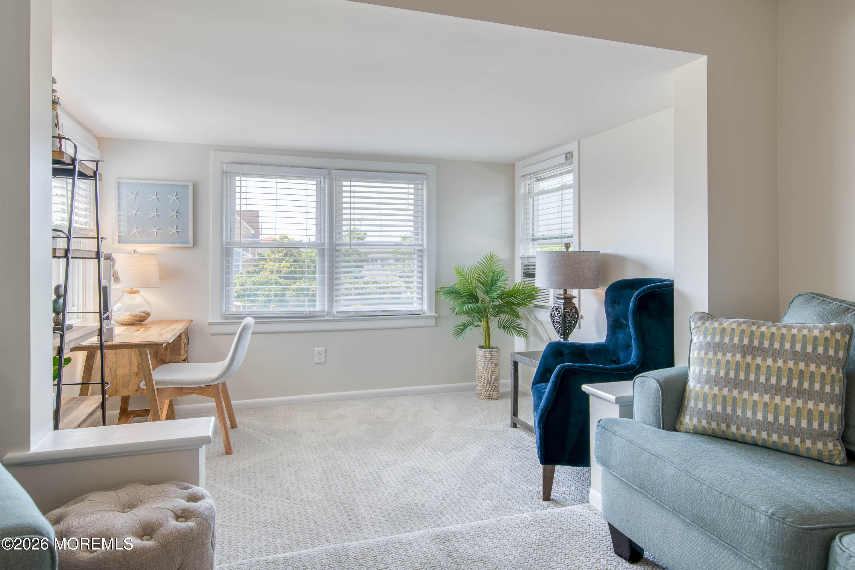 2 Via Ripa, Unit 2 Sea Bright, NJ 07760 - Photo 13 of 27 a living room with furniture and a large window