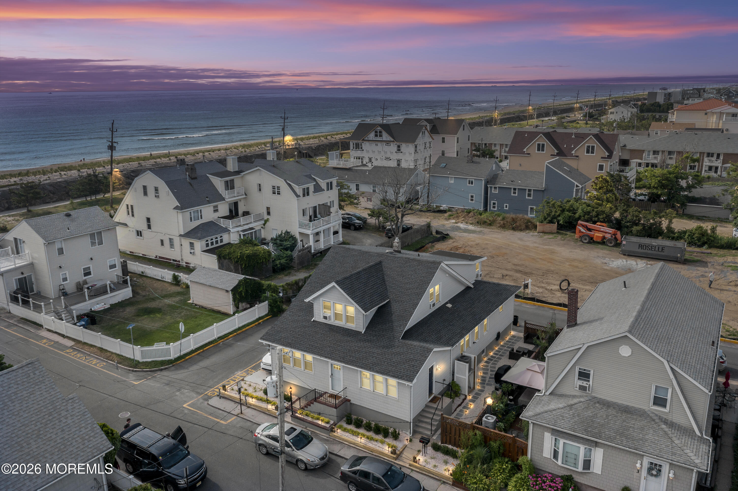 2 Via Ripa, Unit 2 Sea Bright, NJ 07760 - Photo 2 of 27 an aerial view of a house with a yard and lake view
