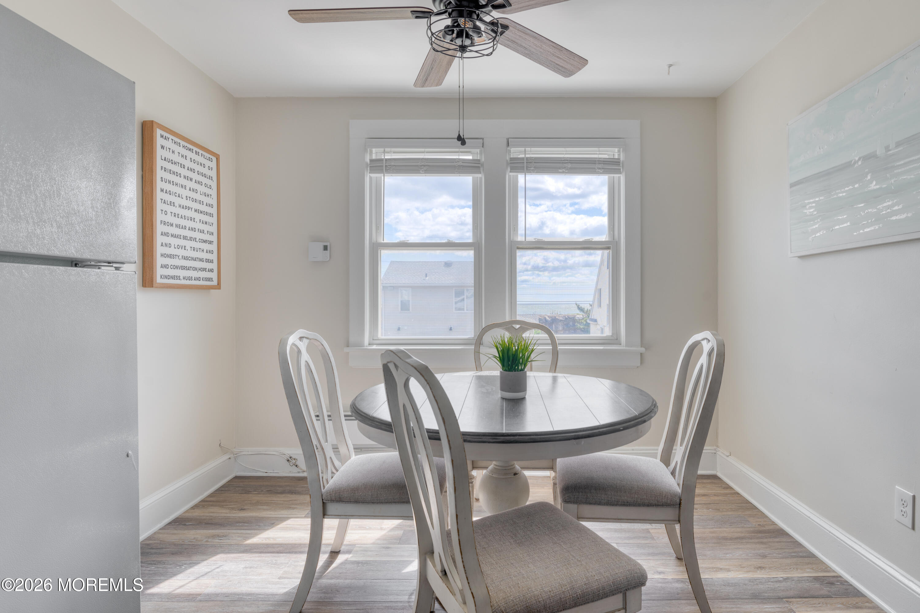 2 Via Ripa, Unit 2 Sea Bright, NJ 07760 - Photo 21 of 27 a view of a dining room with furniture window and outside view