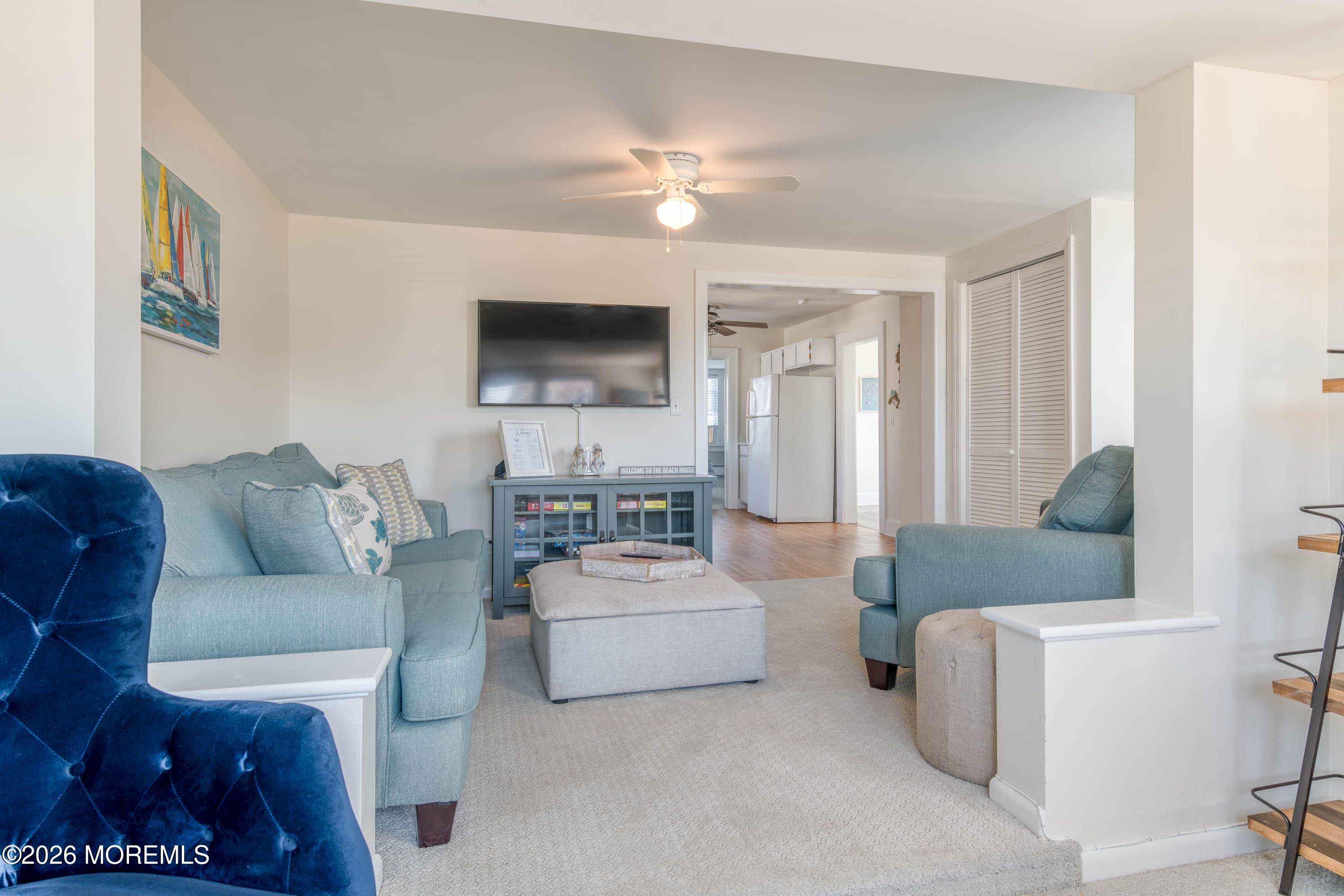 2 Via Ripa, Unit 2 Sea Bright, NJ 07760 - Photo 8 of 27 a living room with furniture a flat screen tv and a couch