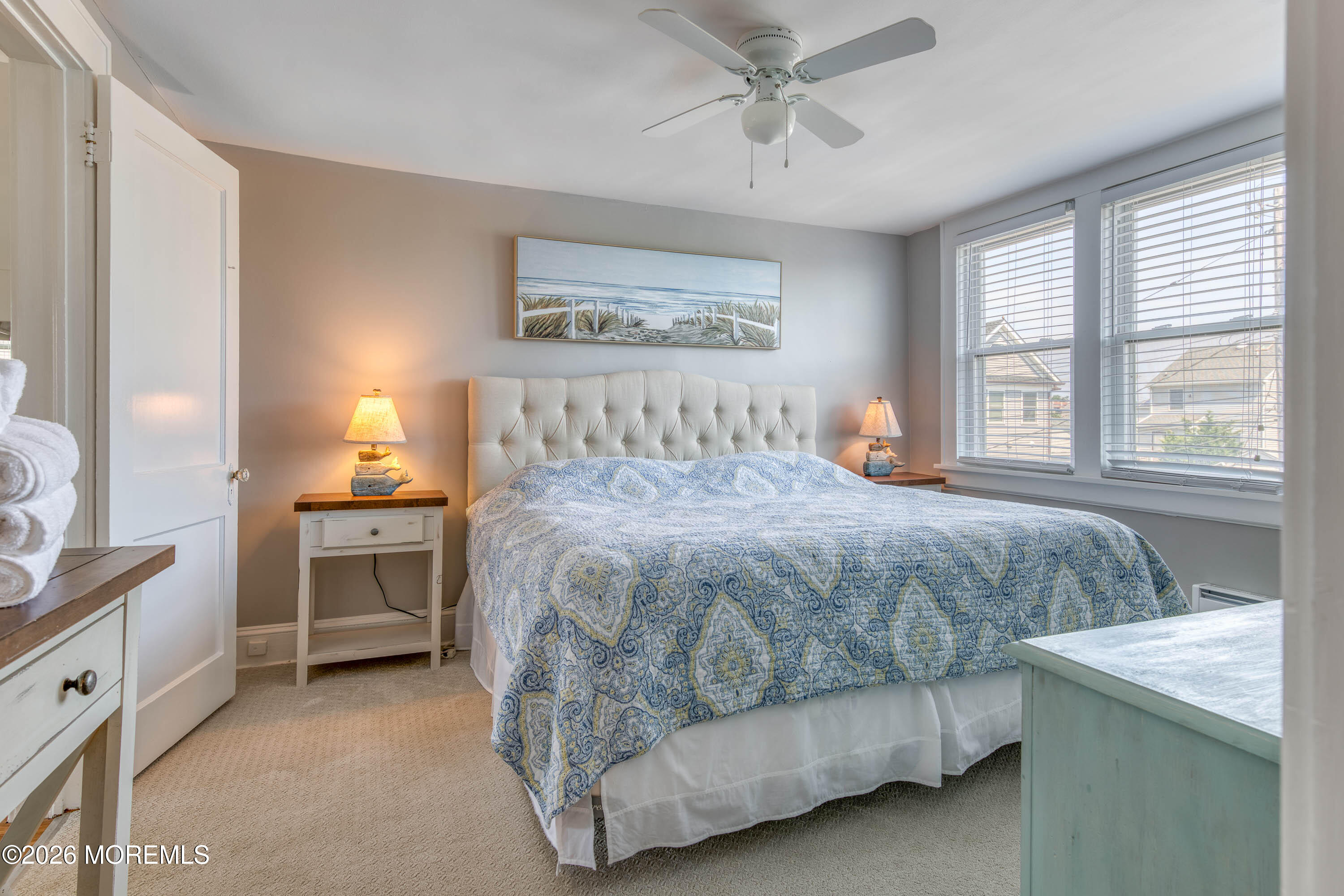 2 Via Ripa, Unit 2 Sea Bright, NJ 07760 - Photo 9 of 27 a bedroom with a bed and a window