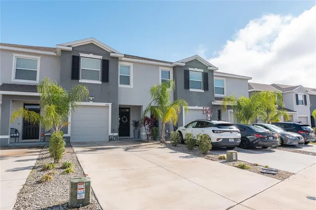 a front view of a house with a patio