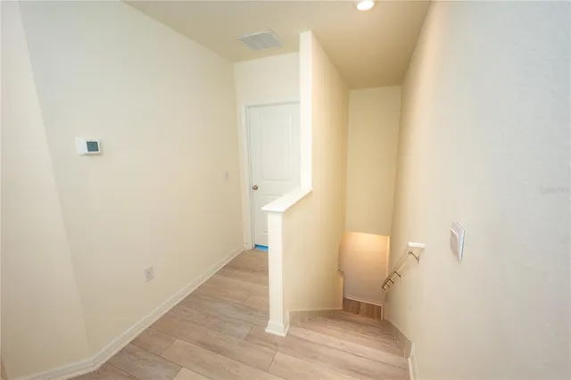 a bathroom with a sink toilet and mirror