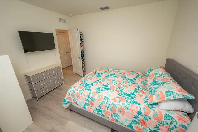 a view of a house with a backyard and porch