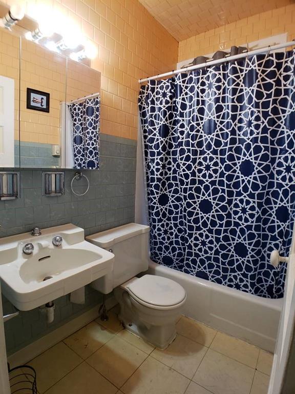 518 Middle Avenue Wilmerding, PA 15148 - Photo 6 of 13 a bathroom with a sink a toilet and a shower