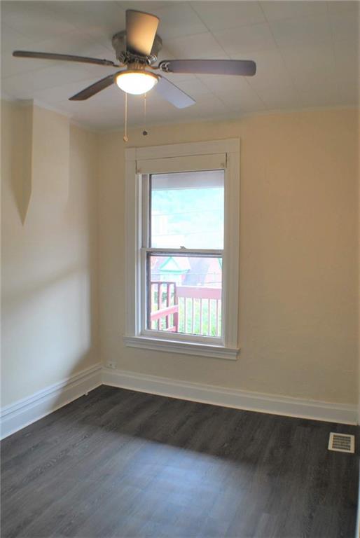 518 Middle Avenue Wilmerding, PA 15148 - Photo 9 of 13 an empty room with a window
