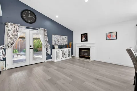 a view of a livingroom with wooden floor