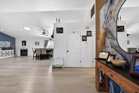 a view of a living room and kitchen