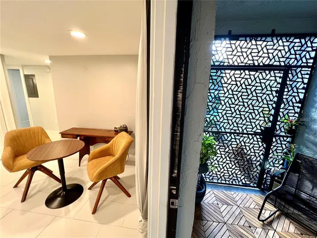 a view of entryway with wooden floor