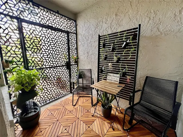 a workspace with furniture and window