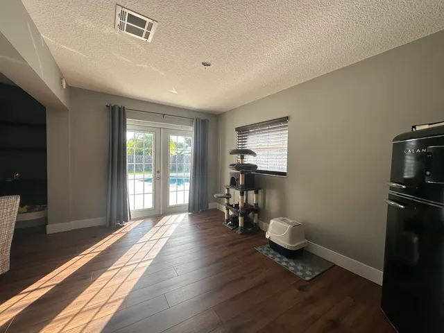 a bathroom with a toilet a sink and a mirror