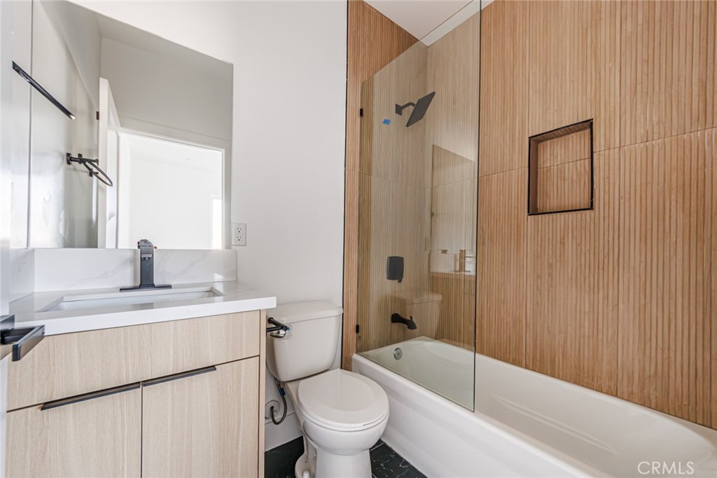 13461 Beach Avenue, Unit 1/2 Marina del Rey, CA 90292 - Photo 24 of 33 a bathroom with a sink toilet and shower