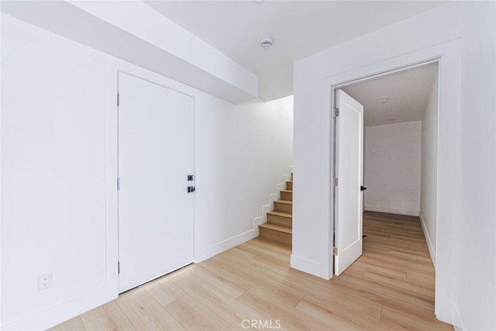 13461 Beach Avenue, Unit 1/2 Marina del Rey, CA 90292 - Photo 5 of 33 a view of a hallway with wooden floor