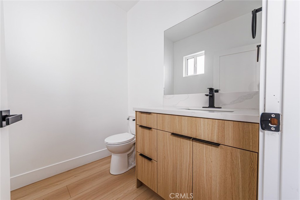 13461 Beach Avenue, Unit 1/2 Marina del Rey, CA 90292 - Photo 7 of 33 a bathroom with a sink and a toilet