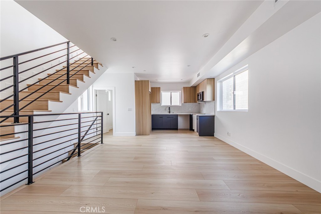 13461 Beach Avenue, Unit 1/2 Marina del Rey, CA 90292 - Photo 9 of 33 a view of a living room with furniture and windows