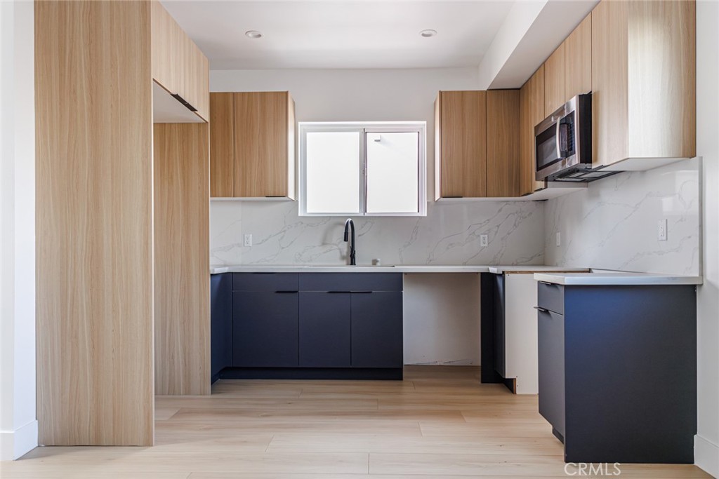 13461 Beach Avenue, Unit 1/2 Marina del Rey, CA 90292 - Photo 10 of 33 a kitchen with stainless steel appliances granite countertop a sink and a granite counter tops