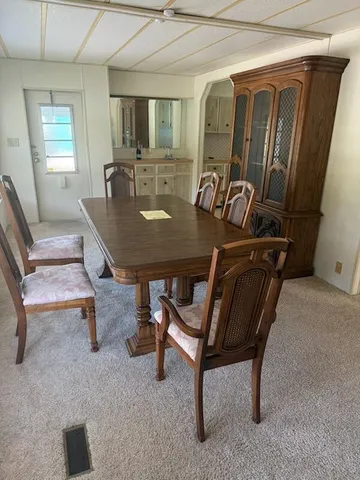 a view of a livingroom with furniture and window