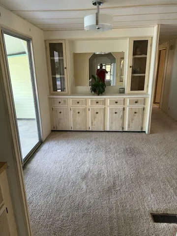 a view of room with front door