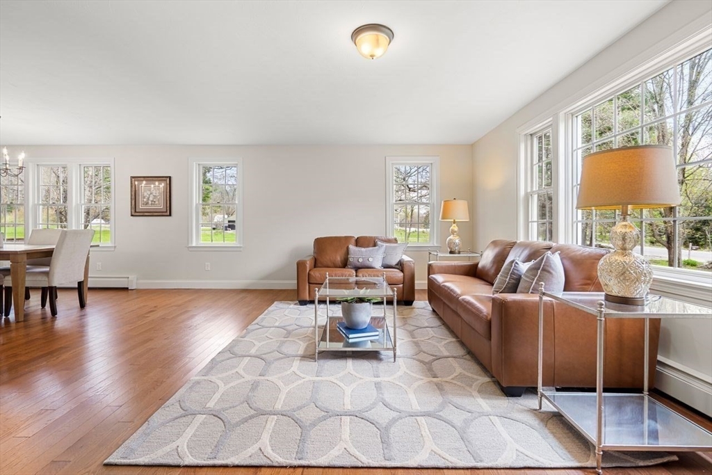 501 Great Road Stow, MA 01775 - Photo 8 of 32 a living room with furniture and a window