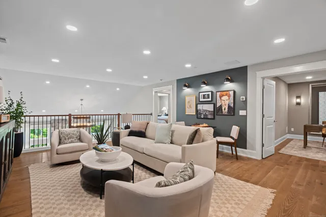 a living room with furniture and a table