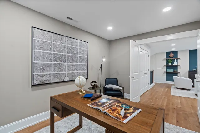 a living room with furniture and a table