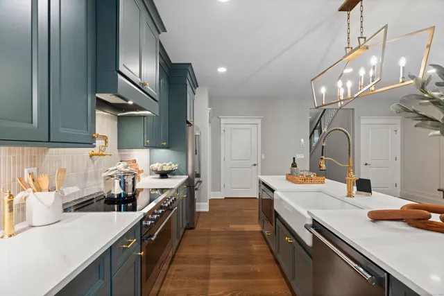 a kitchen with a sink and cabinets