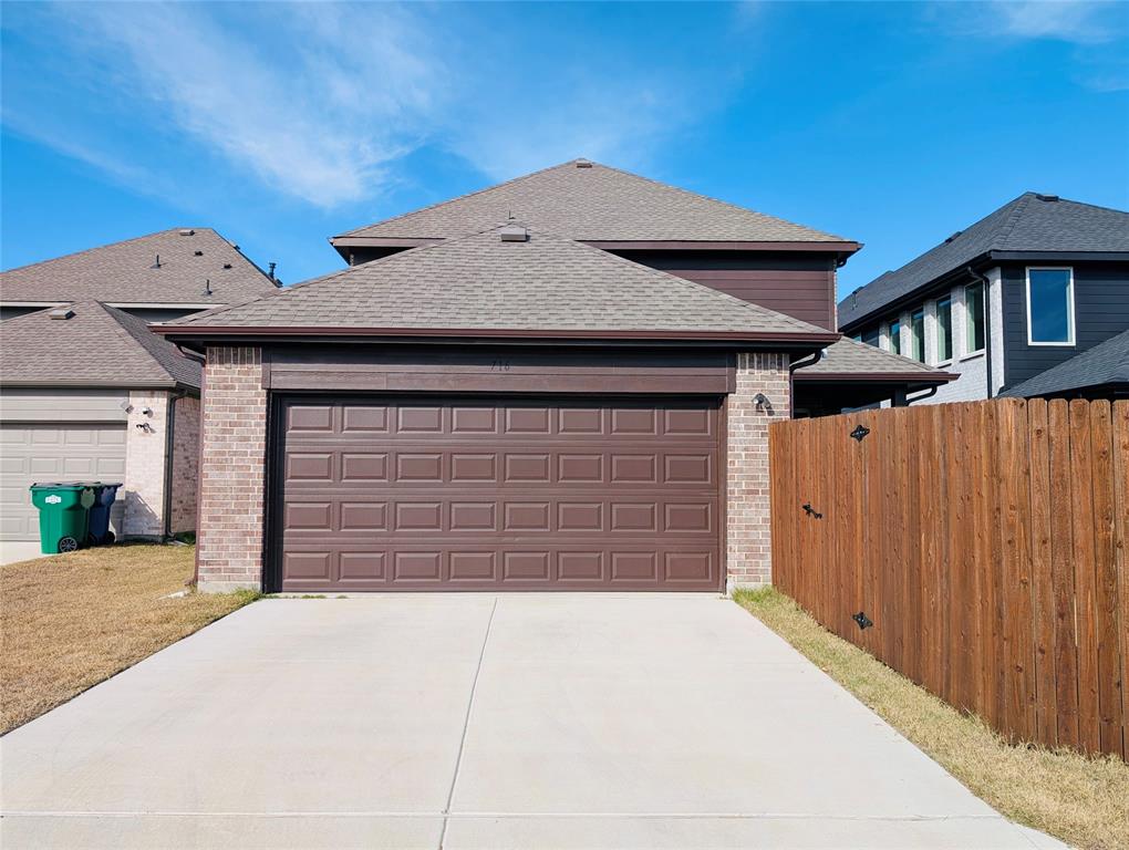 716 Blakelys Way Fate, TX 75189 - Photo 15 of 15 a front view of a house with a garage