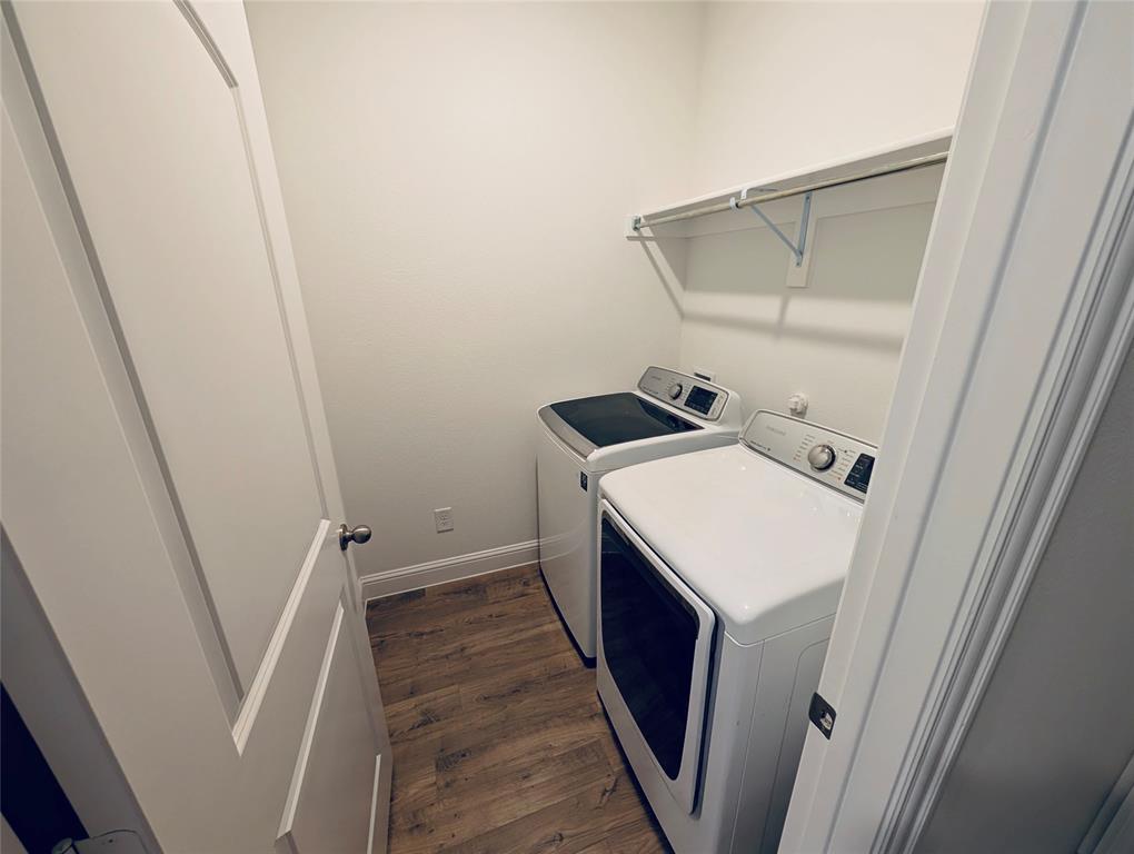 716 Blakelys Way Fate, TX 75189 - Photo 10 of 15 a utility room with dryer and washer