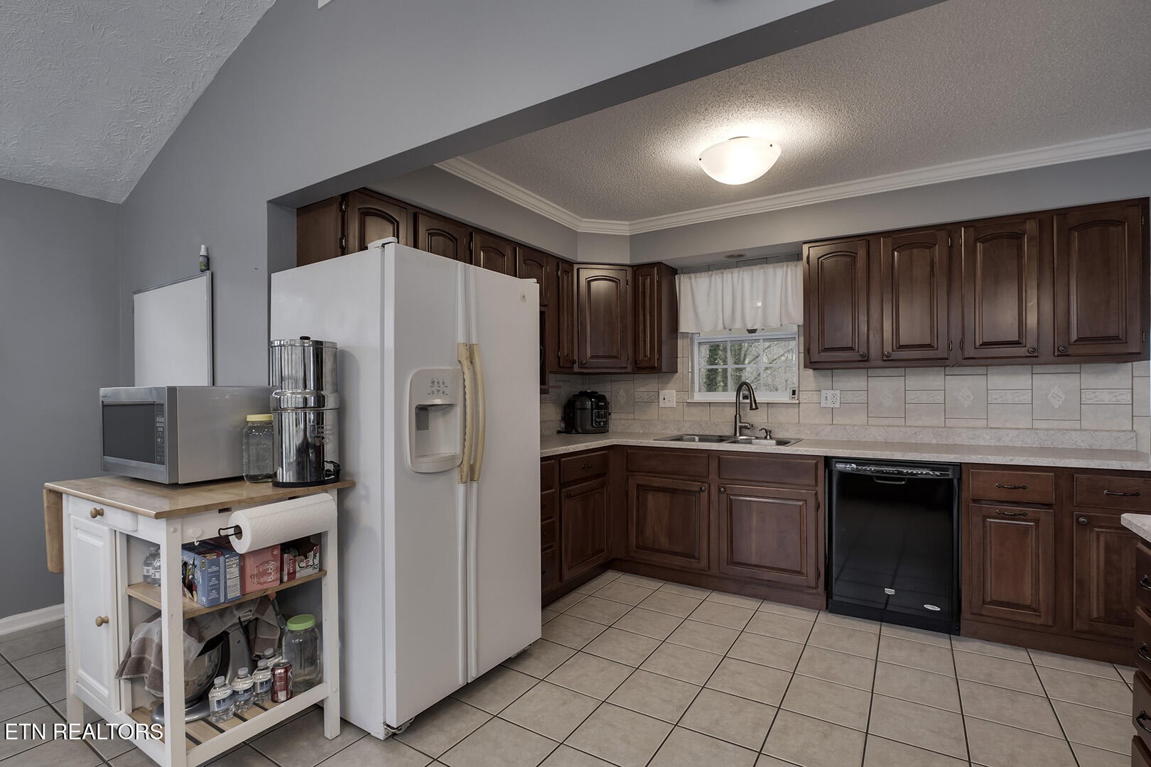 14147 Steekee Road Loudon, TN 37774 - Photo 18 of 59 a kitchen with stainless steel appliances granite countertop a refrigerator and a stove top oven