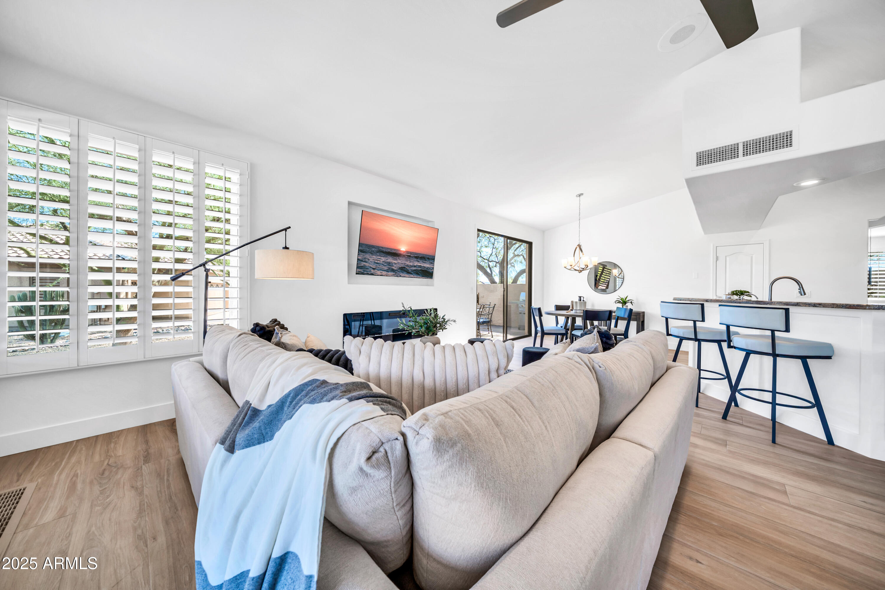 18820 East Gemmill Drive Rio Verde, AZ 85263 - Photo 19 of 72 a living room with furniture and a wooden floor