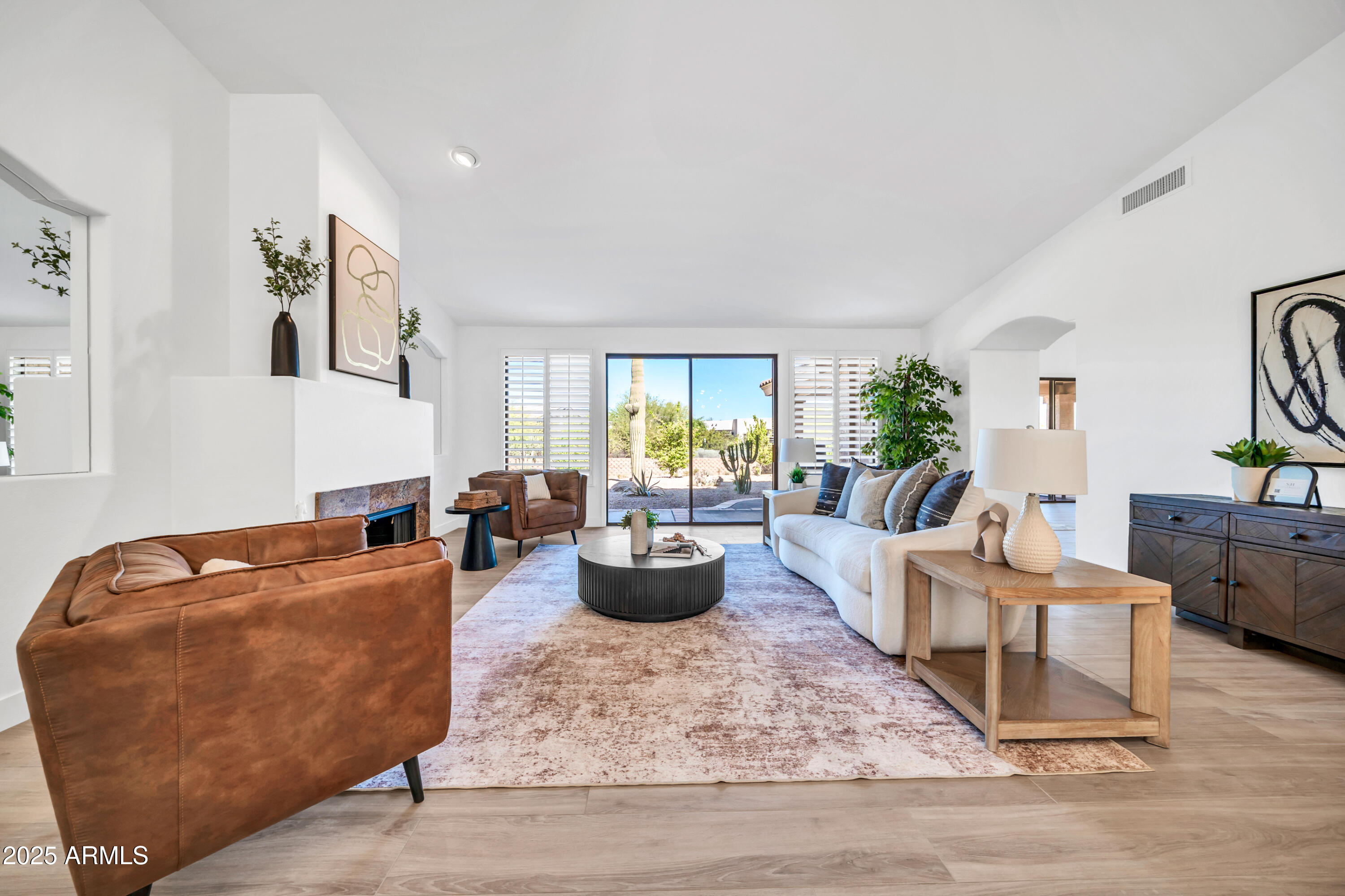 18820 East Gemmill Drive Rio Verde, AZ 85263 - Photo 28 of 72 a living room with furniture and a potted plant