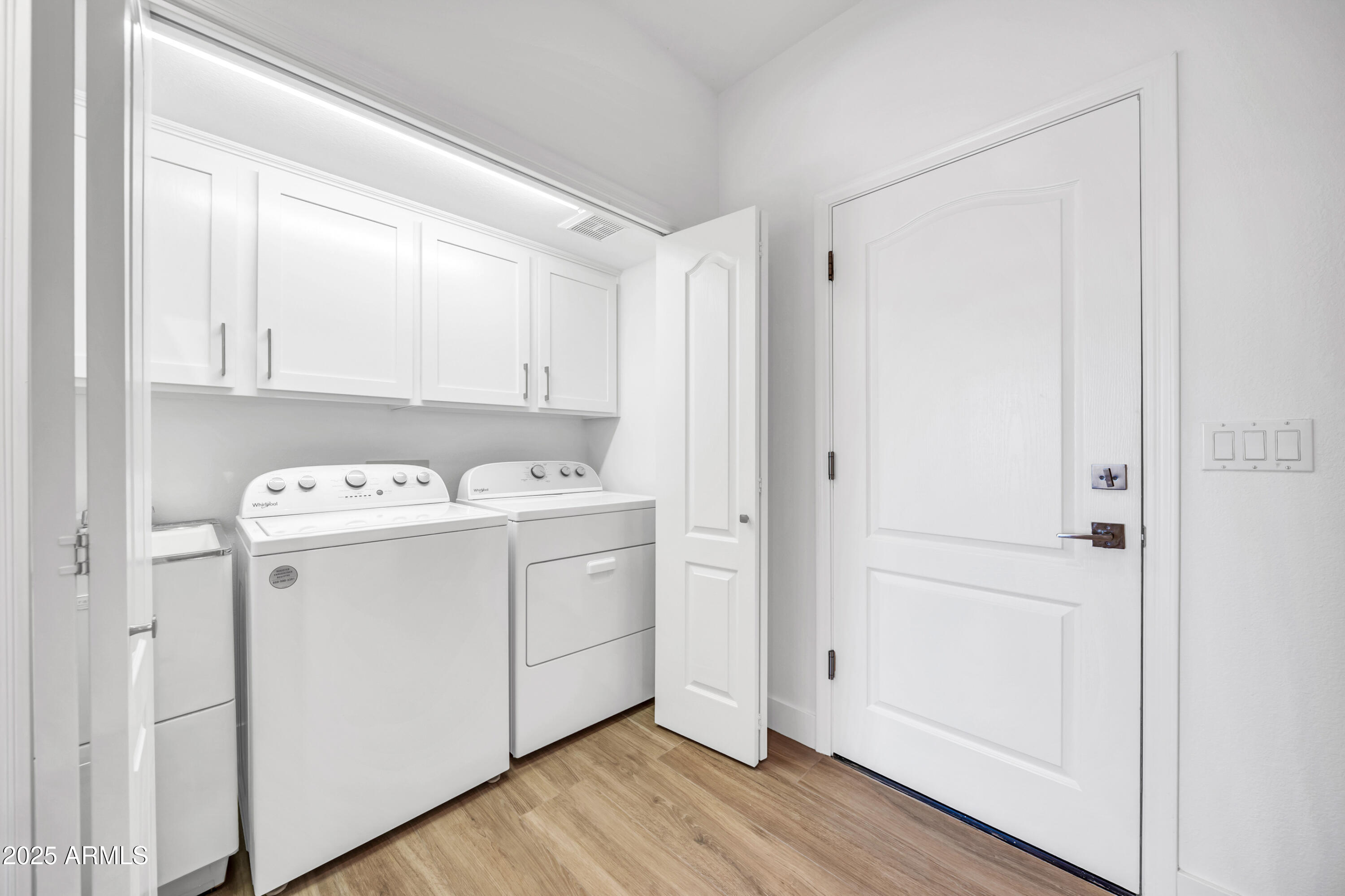 18820 East Gemmill Drive Rio Verde, AZ 85263 - Photo 44 of 72 a view of utility room with wooden floor