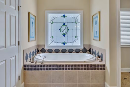 500 Harbor Point Road Silver Point, TN 38582 - Photo 13 of 31 a bathroom with a bathtub and shower