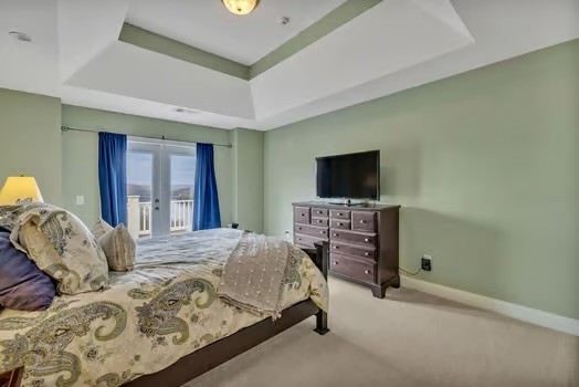 500 Harbor Point Road Silver Point, TN 38582 - Photo 18 of 31 a bedroom with a bed and a flat screen tv