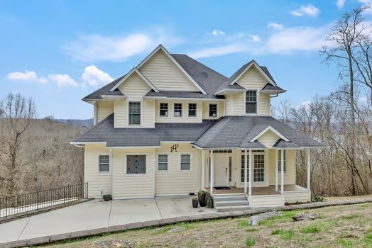 500 Harbor Point Road Silver Point, TN 38582 - Photo 2 of 31 a front view of a house with a yard