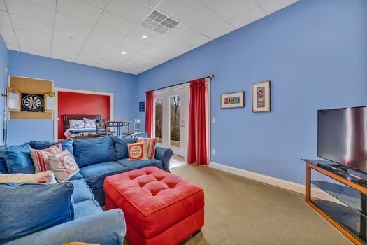 500 Harbor Point Road Silver Point, TN 38582 - Photo 21 of 31 a living room with furniture and a flat screen tv