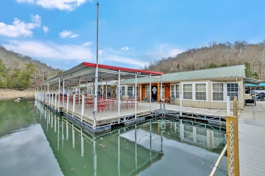 500 Harbor Point Road Silver Point, TN 38582 - Photo 27 of 31 a view of house with swimming pool and sitting area