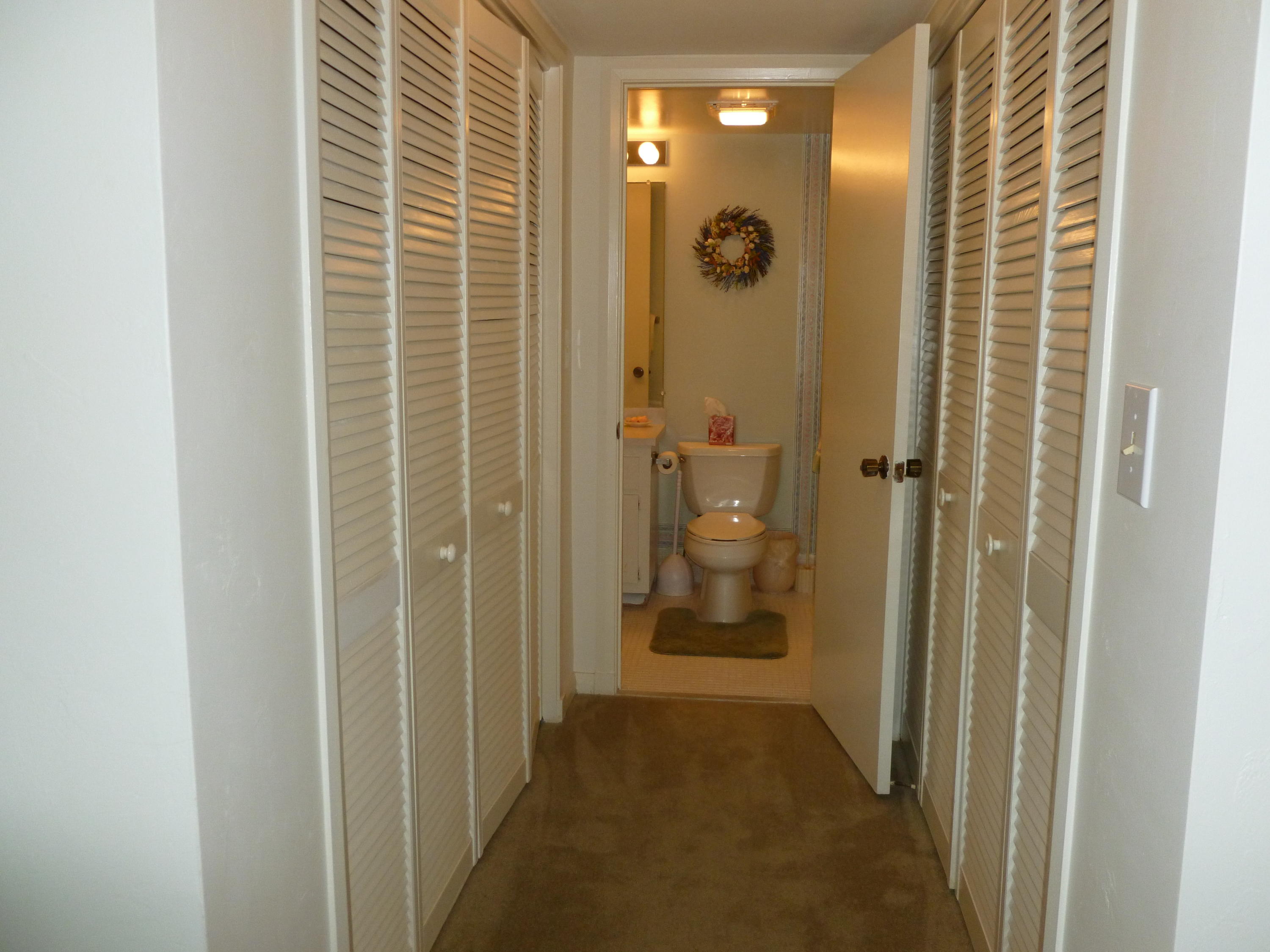 6 Concourse Drive, Unit 6B Jupiter, FL 33469 - Photo 17 of 28 GUEST BEDROOM CLOSETS