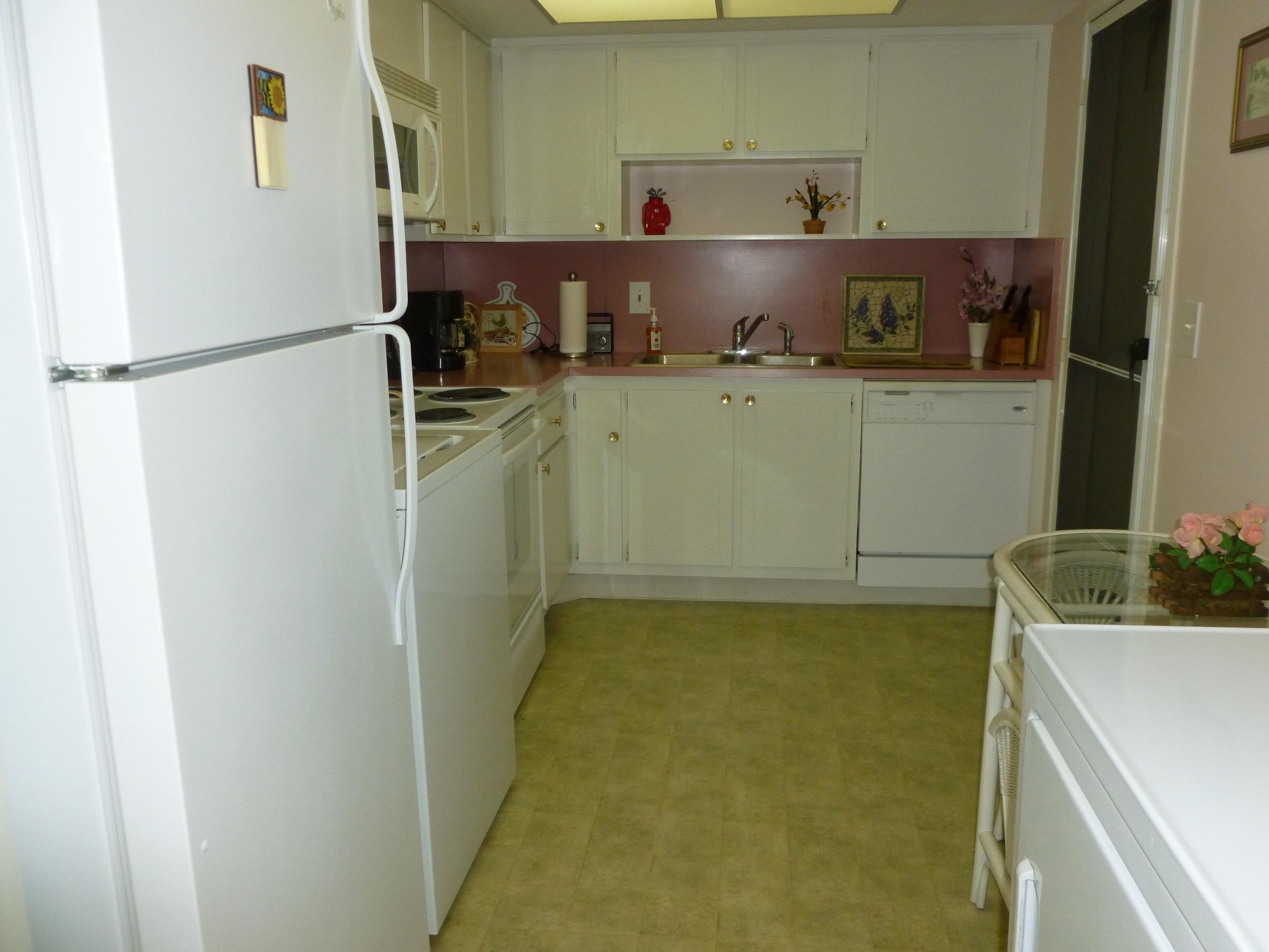 6 Concourse Drive, Unit 6B Jupiter, FL 33469 - Photo 20 of 28 KITCHEN