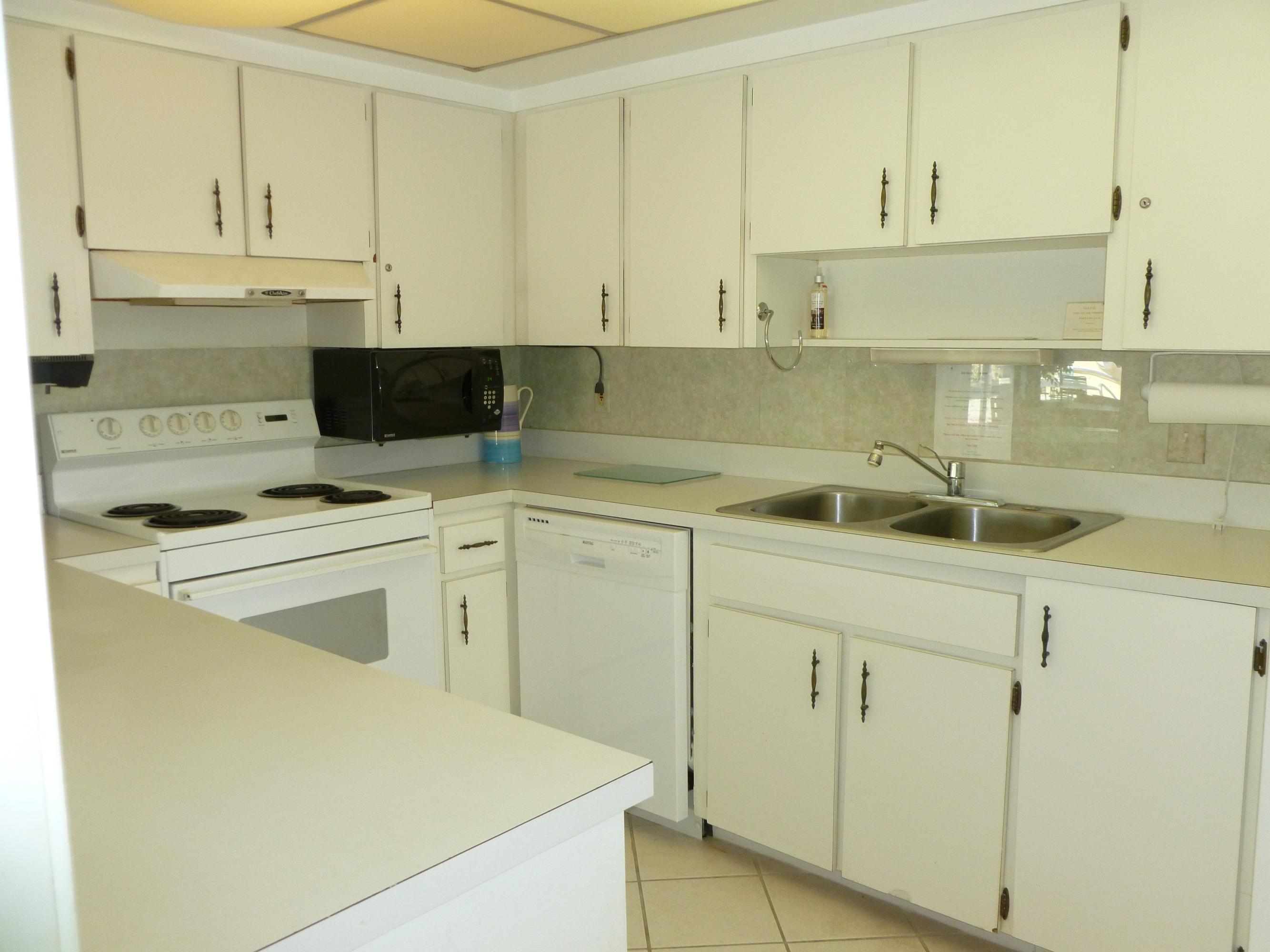 6 Concourse Drive, Unit 6B Jupiter, FL 33469 - Photo 28 of 28 CLUBHOUSE KITCHEN