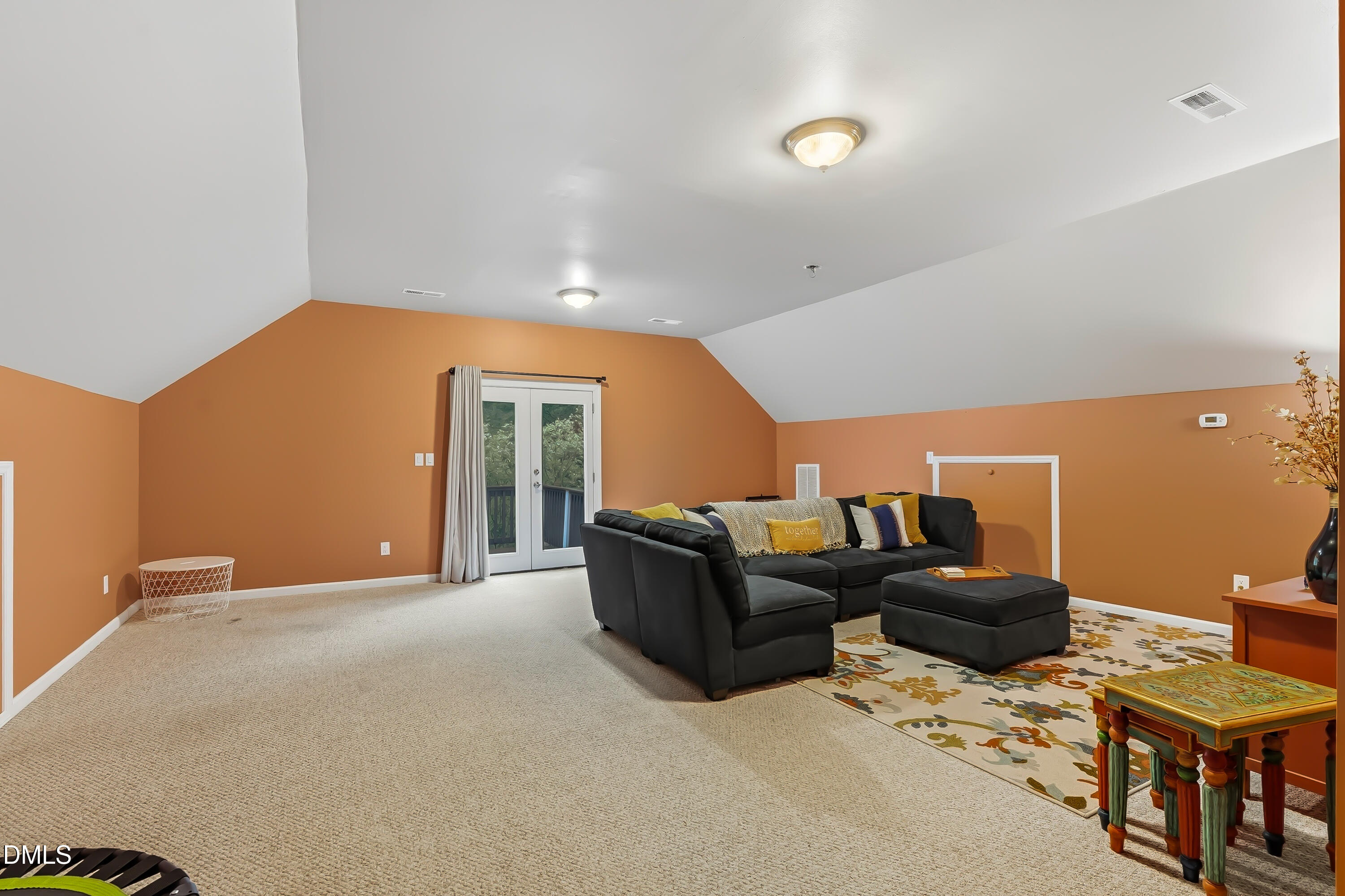 1214 Halcyon Place Rougemont, NC 27572 - Photo 38 of 69 a living room with furniture and a flat screen tv
