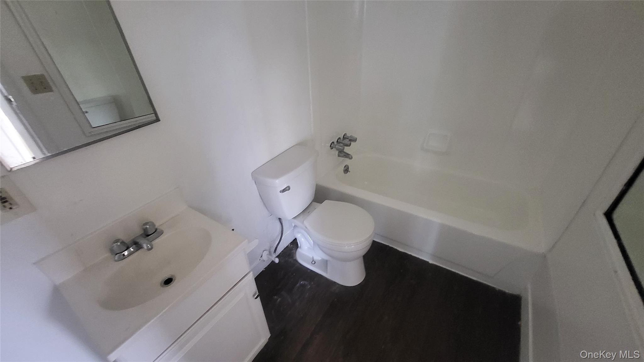 67 Academy Street, Unit 3 Poughkeepsie, NY 12601 - Photo 23 of 25 Bathroom 1 is located close to the living room & kitchen