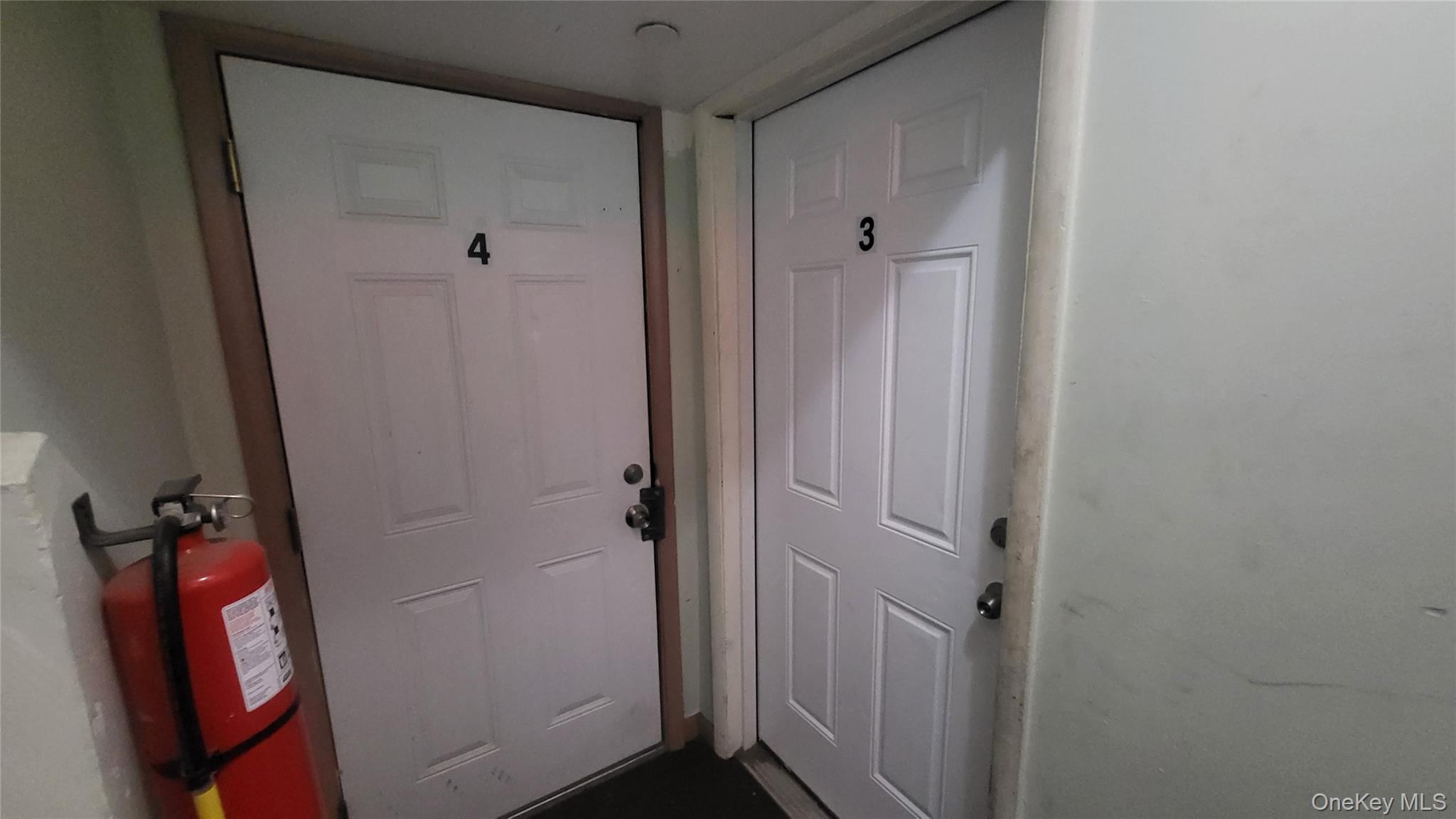 67 Academy Street, Unit 3 Poughkeepsie, NY 12601 - Photo 4 of 25 Entry door to Apt 3
