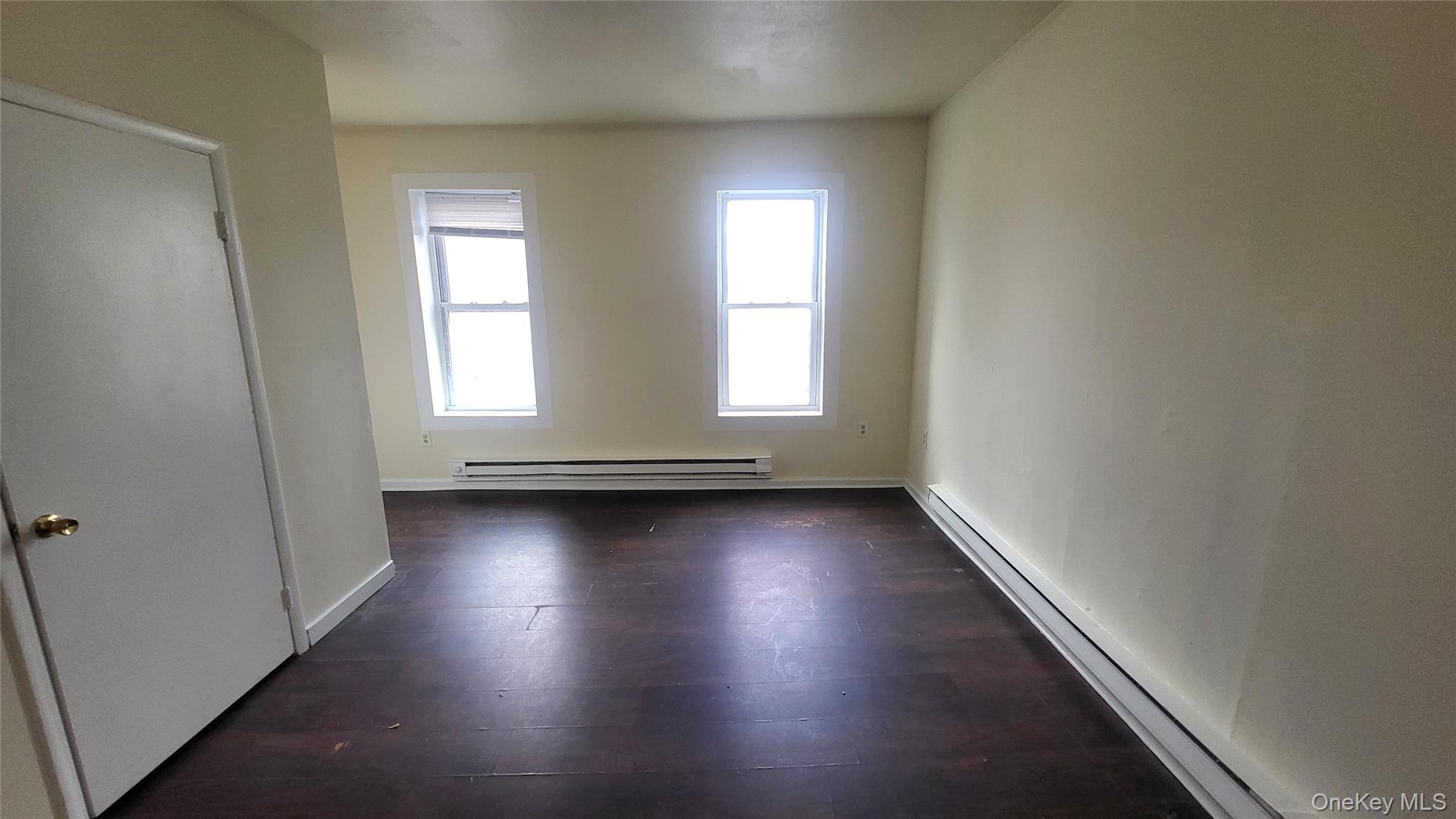 67 Academy Street, Unit 3 Poughkeepsie, NY 12601 - Photo 10 of 25 Entry door from hall into living room