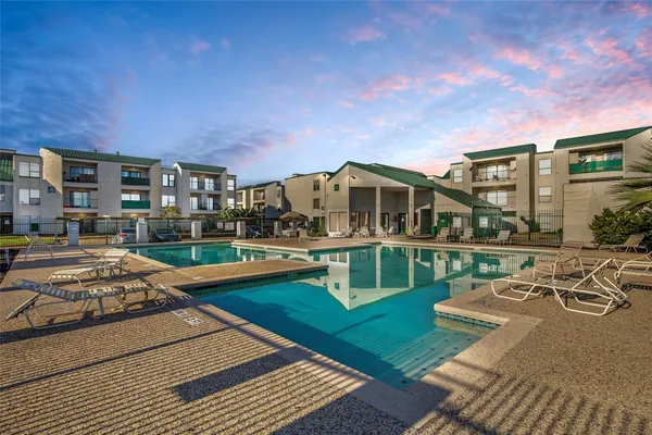 a view of a house with a swimming pool