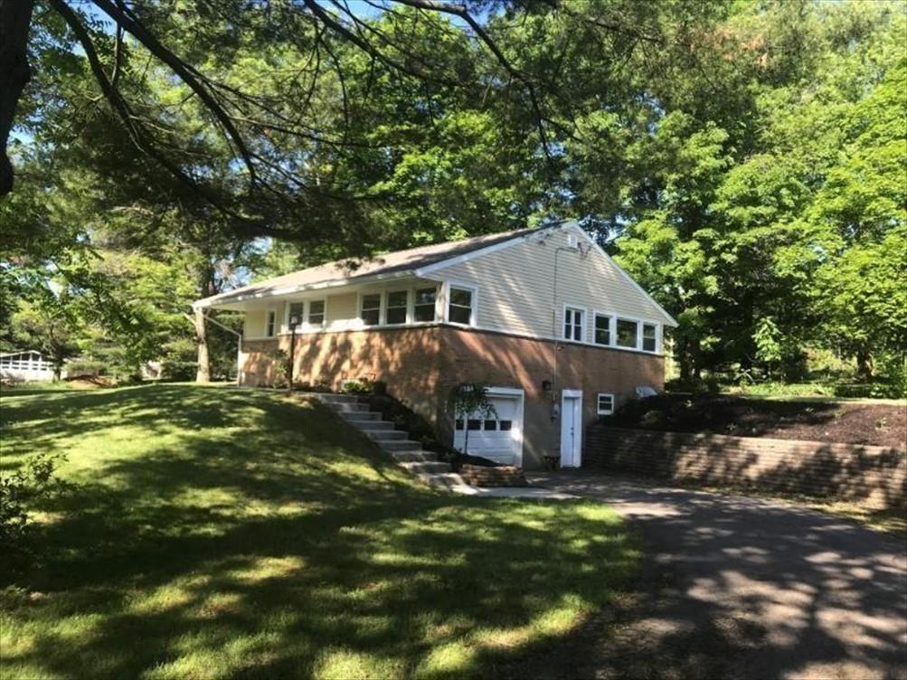 8131 Rowan Road Cranberry Township, PA 16066 - Photo 20 of 21 a view of a house with a yard