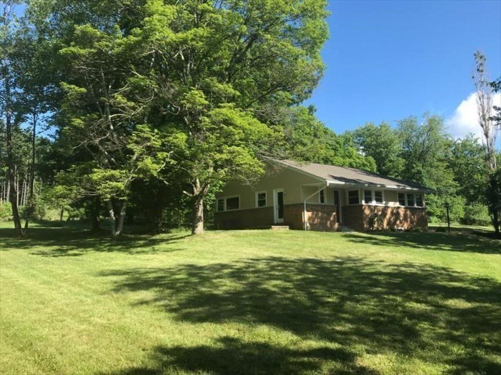 8131 Rowan Road Cranberry Township, PA 16066 - Photo 2 of 21 a house that has a big yard