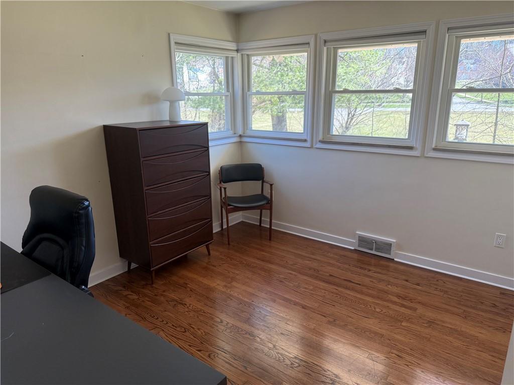 8131 Rowan Road Cranberry Township, PA 16066 - Photo 9 of 21 a room with a chair and a window