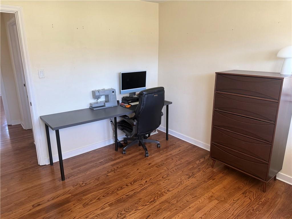 8131 Rowan Road Cranberry Township, PA 16066 - Photo 10 of 21 a view of a workspace with furniture and wooden floor
